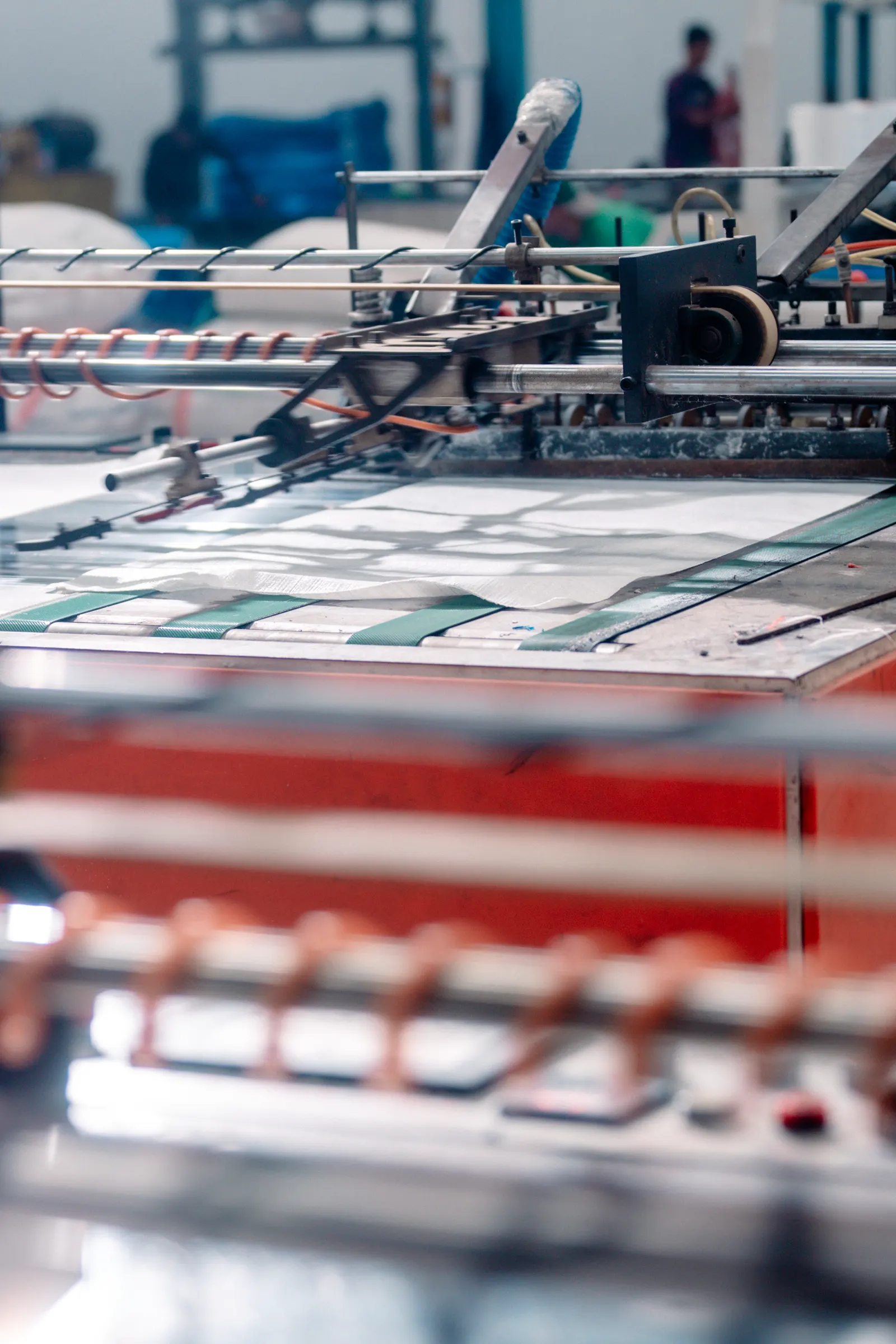 Top hemming process for woven sacks at Magna